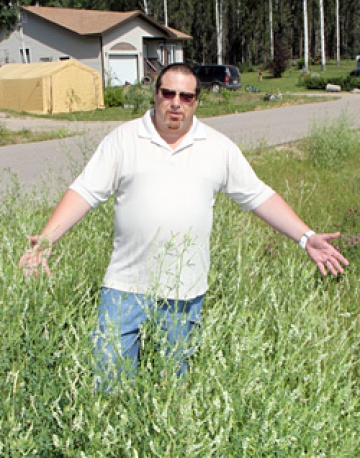 Protesting changes to town grass cutting policy, it was almost a forest of weeds!